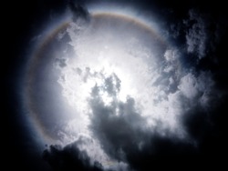 Fantastic Beautiful Sun halo phenomenon and clouds in sky or the sun with circular rainbow.