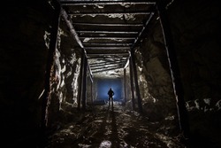 A man staying underground in Sokskie galleries in Samara, Russia