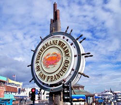 Fisherman's Wharf sign of San Francisco on a beautiful sunny blue sky day.