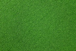 Surface of fake green grass for background or backdrop.