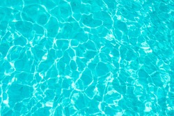 Abstract beautiful ripple wave and clear turquoise water surface in swimming pool, Turquoise or blue water wave for background and abstract