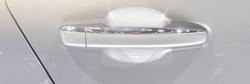 White car door handle. Selective focus