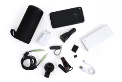 Mobile accessories includes power bank, speaker, charger, smart watch, handsfree, AUX cable, microSD, adapter and macro clip lens flat lay