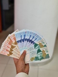 Currency Pakistani Rupees in hands