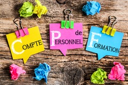Colorful bubbles shaped paper with the French acronym word 
