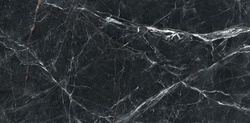Black marble stone background with white curly streaks. decorative marbling, Creative texture of marble granite and white foil. Abstract breccia marble for ceramic slab tile, wallpaper and kitchen. 