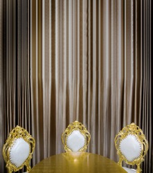 luxuary golden table and seat decoration in dining room - use for background