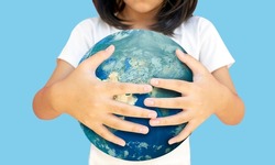 Hug on earth show love global on earthday concept  kids model and earth oisolated background. ecology concept. symbolic earth to Elements of this image furnished by NASA (include path)