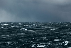 Fishing trawler in a storm in the atlantic ocean