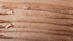 Macro photography of the cosmetic highlighter with shimmer.