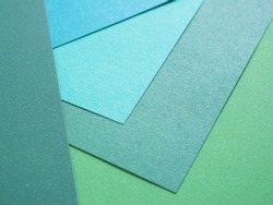 Empty gradient green colored paper background texture. Abstract geometric flat composition. The concept for image, text, and design.