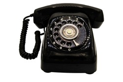 Old black retro rotary Telephone isolated on White background with clipping path. Vintage style.