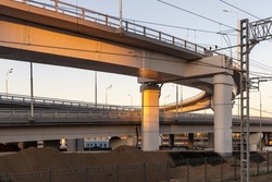 Construction of an automobile turning overpass. Two-level road junction and improvement of the roadside area