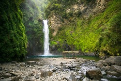 Waterfall in a mountain gorge, Philippines.