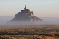 Beautiful panoramic view of the famous tidal island of Le Mont Saint-Michel estate, Normandy, Northern France