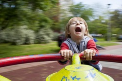 Child on merry-go-round 