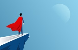Businessman standing at cliff wearing red cape as superhero, business ambition and courage