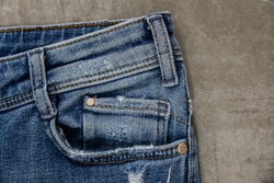 Close up of blue jeans ,Blue Jeans texture-gray background