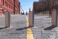 Moscow: Poles of Traffic blockers. Enter to Red Square via Kremlin passage (Kremlevsky proezd). Protection against the passage of vehicles. Steel automatic traffic blockers.