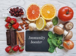 Assortment of food to naturally boost immune system. Healthy eating for strong immune system. Immune-boosting foods. Concept of helpful ways to strengthen immunity naturally.