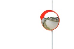 The traffic curve mirror, convex mirror on the road for safety isolated on white background with clipping path. The virtual image is upright, smaller than the object.