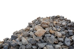Piles of gravel limestone rock on construction site, isolated on white background with clipping path.