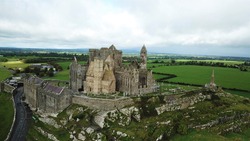 This aerial shot shows the rock of cashel, a historic site located in ireland.
