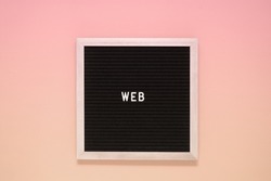 The word web on black board on isolated beige background