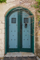 Doors and windows of stone houses in Alaçatı in summer