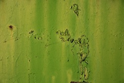 Rustic green paint textured surface.