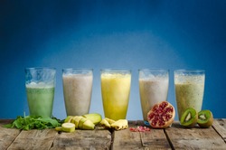 Smoothie day, healthy and delicious, very simple, lots of possible variation - banana, pineapple, pomegranate, herbs and kiwi.