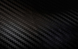 Carbon fiber texture background with right light Carbon fiber composite raw material background