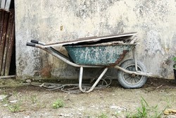 old rusty vintage wheel barrow