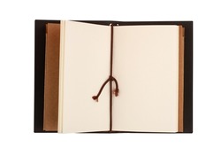 top view closeup of open vintage notebook with empty pages and brown paper cardboard covers isolated on white background