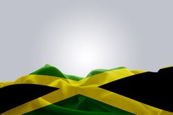 waving abstract fabric Jamaica flag on Gray background