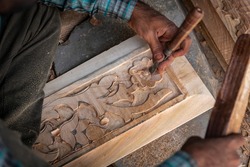 Wood carved furniture in India