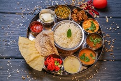 South Indian Non-Veg Thali With 7 Curries, Rice, Roti and Papadums