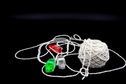 Ball of string with finger LED lights attached