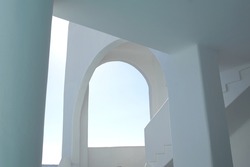 Famous white-painted Greek architecture with arches and colums at Oia, Santorini