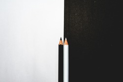 Just two pencils explaining the contrast