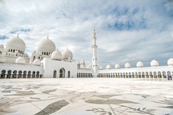 The beautiful world's largest mosque called Sheikh Zayed Grand Mosque located in Abu Dhabi, the capital city of the United Arab Emirates,close to Dubai, inside lateral shot during vacation/holiday