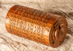 Bronze cryptex invented by Leonardo da Vinci from the book da vinci code. Word creativity as password set by letters rings. Cryptographic equipment printed on a 3D printer