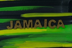 The word 'Jamaica' on background of color of the national flag. Jamaica  is an island country situated in the Caribbean Sea.