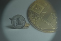 Closeup Litecoin on white background.  Litecoin is a peer-to-peer cryptocurrency and open-source software project.
