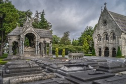 Ancient, beautifully ornate sarcophagus, graves and mausoleum in Glasnevin Cemetery, Dublin, Ireland