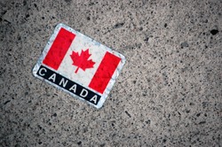 Canadian flag sticker on Canada Day walking along Sussex Street Ottawa Ontario Canada.