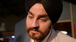 A closeup shot of an Indian businessman