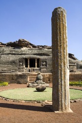 A bid rock pillar in front of Ravan Pahadi cave temple at Aihole in Bagalkot, Karnataka, India, Asia