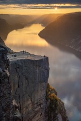 A vertical shot of the Pulpit Rock and Lysefjorden during the sunset in Norway