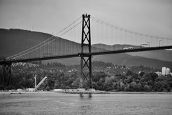 A greyscale shot of a bridge in Vancouver